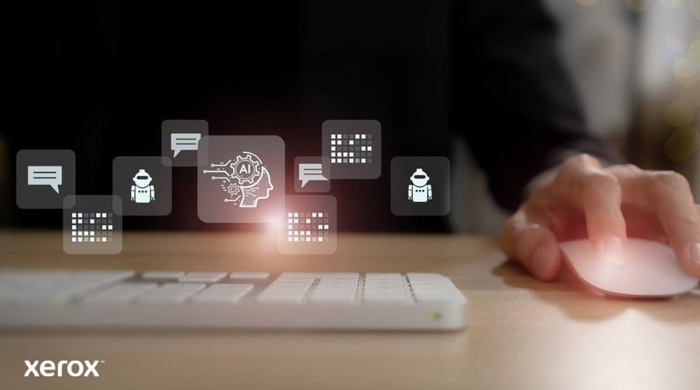 La mano de una persona está sobre un mouse de computadora, con íconos brillantes abstractos relacionados con la comunicación, la IA y el procesamiento de datos flotando sobre el teclado, representando funcionalidades de documentos inteligentes.